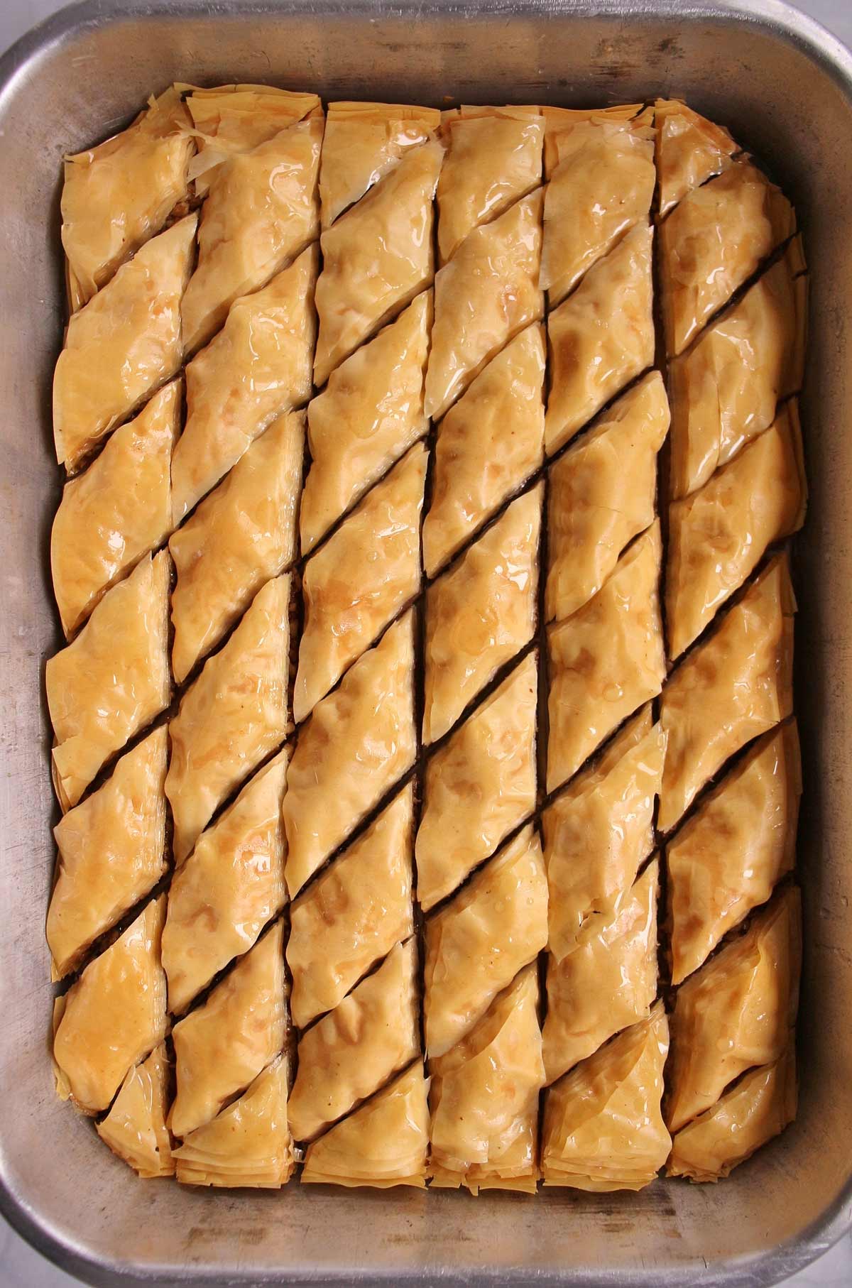 A tray of Armenian paklava cut into diamond shapes.