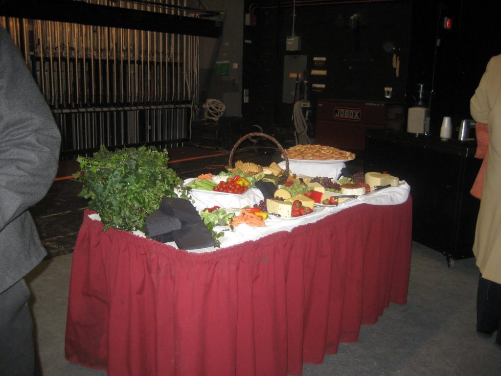 a buffet table set up with platters of food