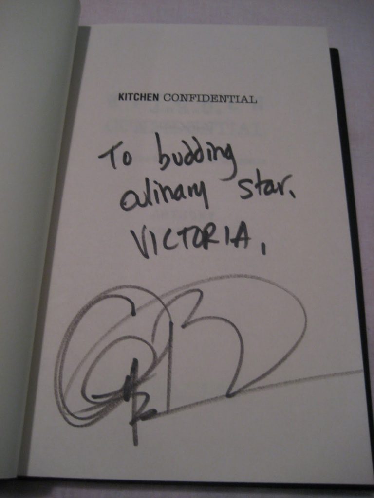 Anthony Bourdain\'s autograph inside a copy of Kitchen Confidential