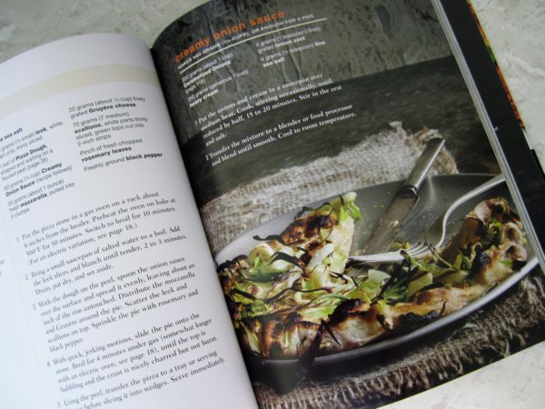 snapshot of a pizza photo inside a cookbook