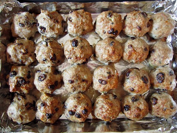 overhead view of a baking pan filled with baked meatballs