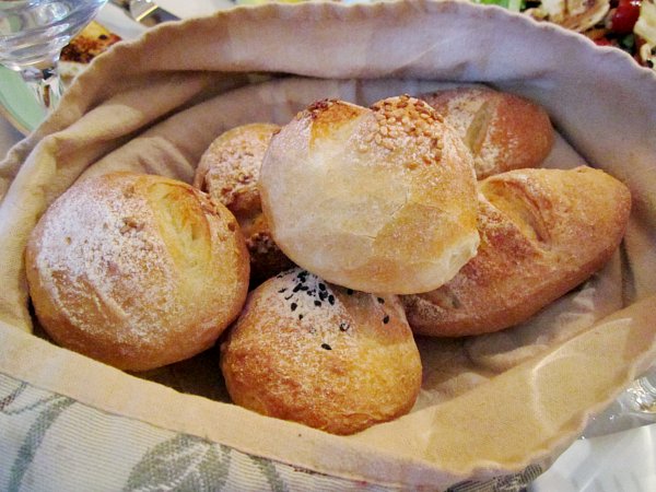 A close up of a basket of bread