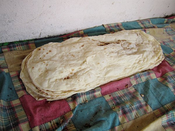 piles of lavash flatbread on a colorful quint