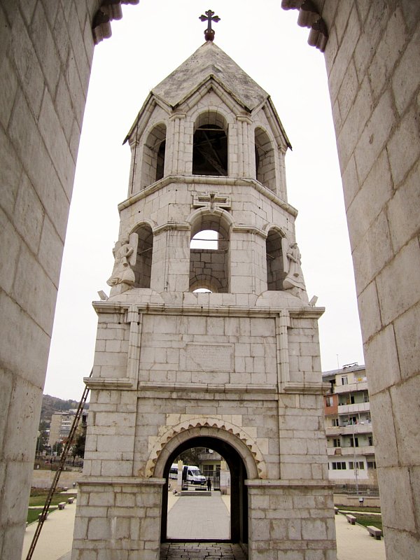 closeup of part of a white stone church