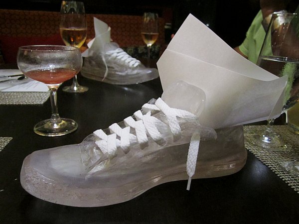 a sneaker shaped serving dish on a table