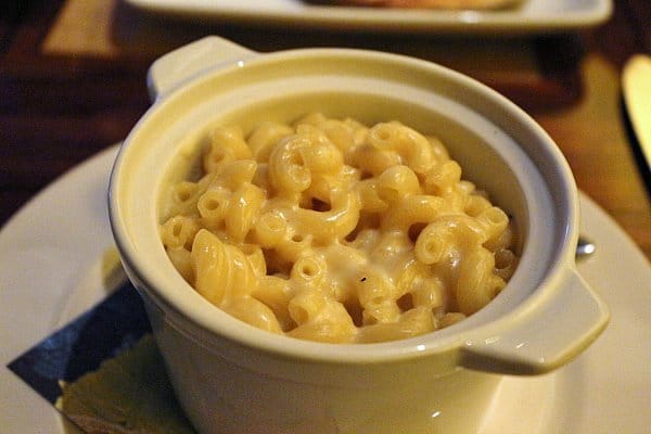 A white bowl of macaroni and cheese