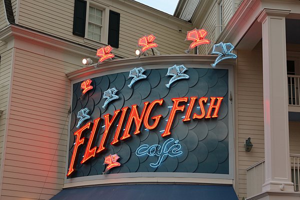 a lit up sign that says Flying Fish Cafe