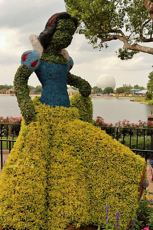 a topiary in the shape of Snow White