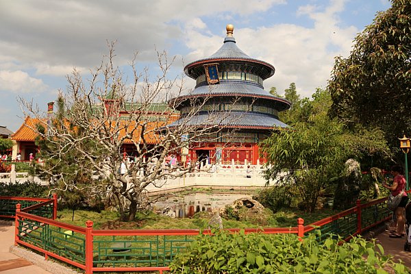 a Chinese style building with a garden in front in the China Pavilion in Epcot