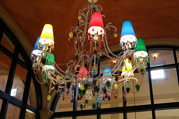 a colorful chandelier hanging from the ceiling