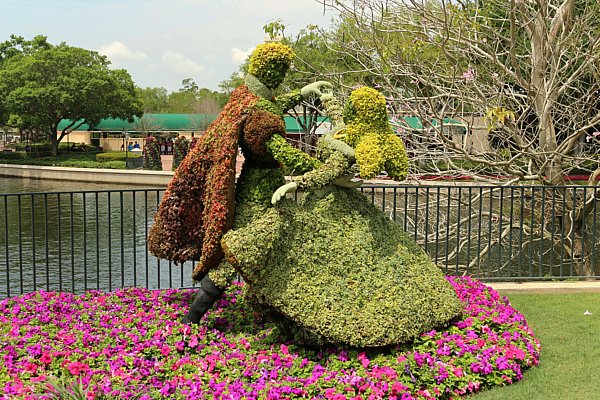 a topiary of Sleeping Beauty and the Prince dancing together