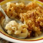 a spoonful of baked macaroni and cheese