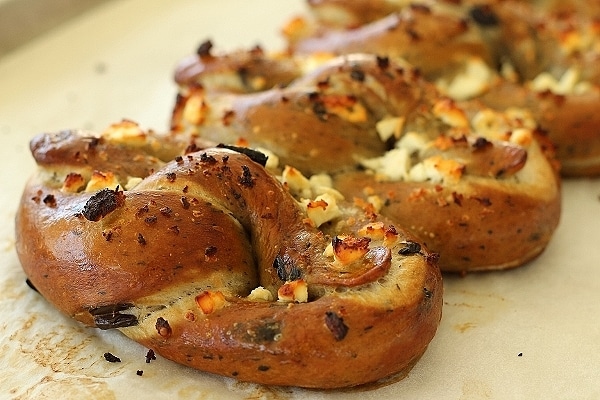 olive and garlic soft pretzels with feta cheese