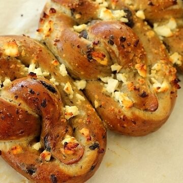 olive and garlic soft pretzels with feta cheese