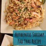 overhead view of two square plates with shrimp pad thai noodles