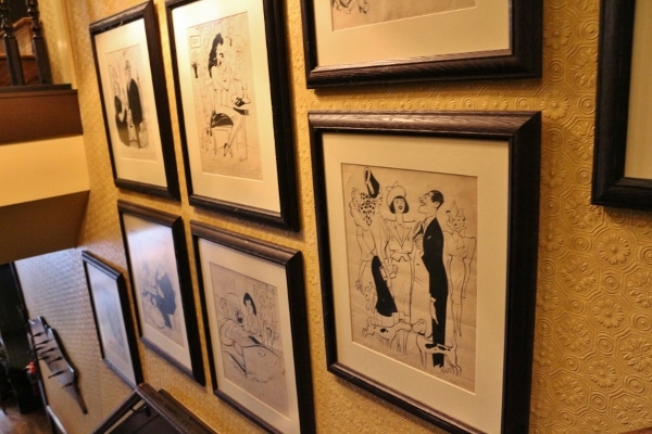 framed illustrations on a wall