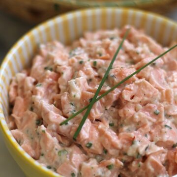 closeup of salmon rillettes in a yellow bowl