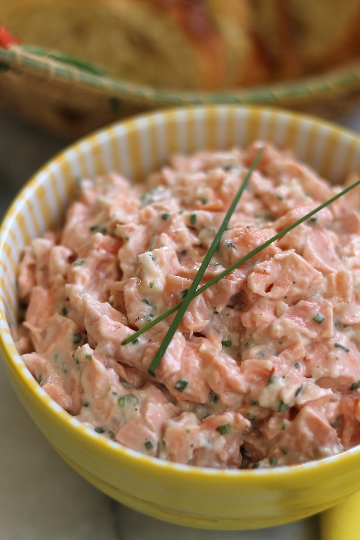 closeup of salmon rillettes in a yellow bowl