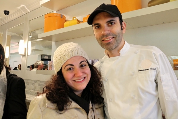 a woman and man posing for the camera