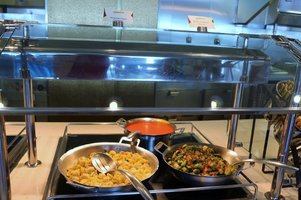 pans of food on a buffet