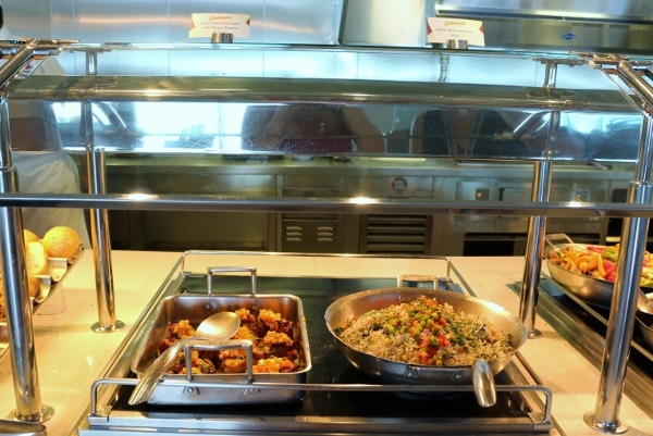 two pans of food on a buffet line