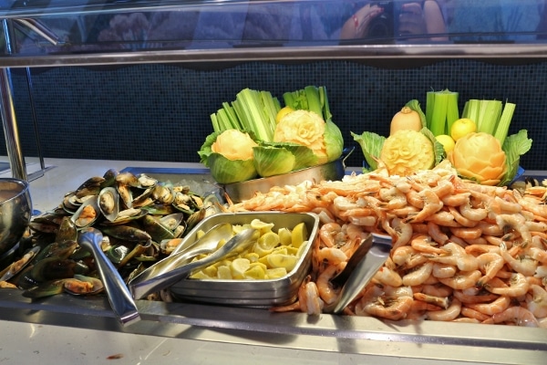 mussels, shrimp, and lemons set up on a cold buffet line