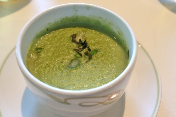 A bowl of green soup