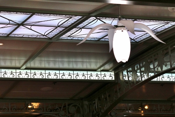 flower shaped white lights hanging from a ceiling