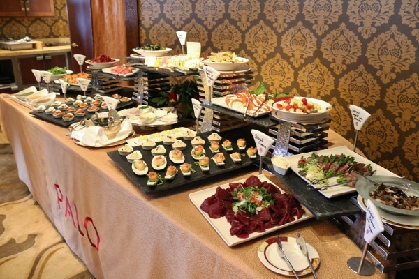 small dishes of cold foods on a buffet table