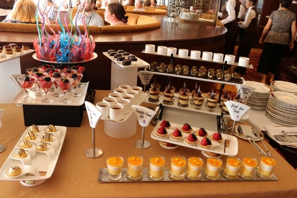 a dessert buffet with colorful bite-sized desserts