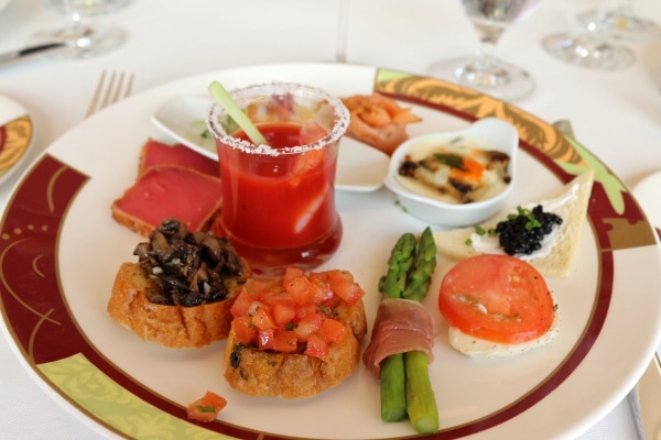 a plate of food selections from a buffet