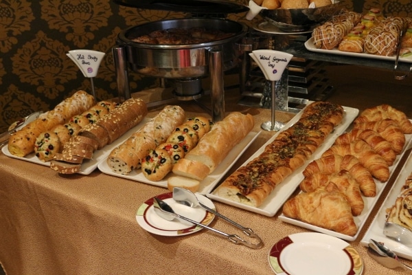 a variety of breads on a buffet