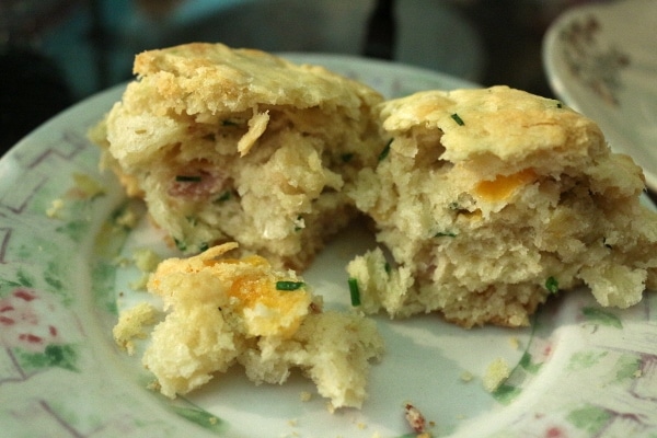 a scone broken apart on a plate
