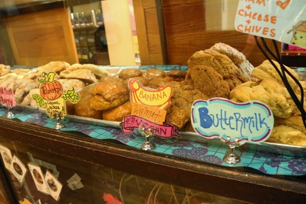 A closeup of a store display of scones