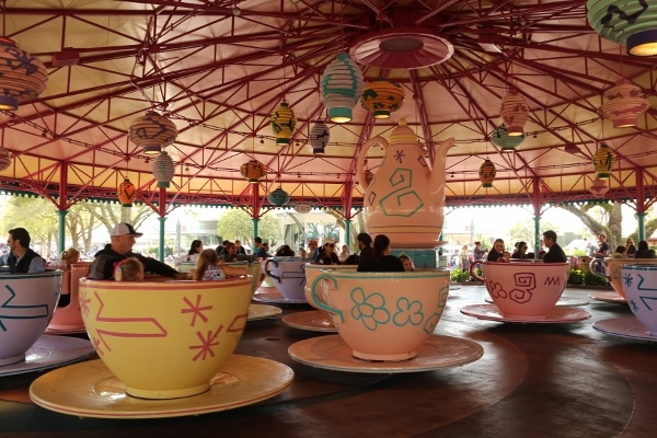 the Mad Hatter spinning tea cups ride under a pink roof
