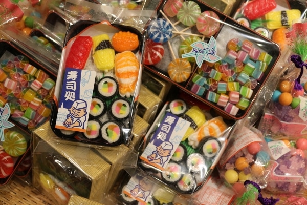 small boxes of candy shaped like sushi