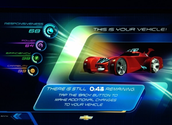 A screen shot of a red sports car built in Test Track