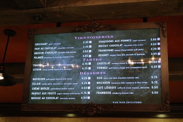 A close up of a screen with a food menu on it