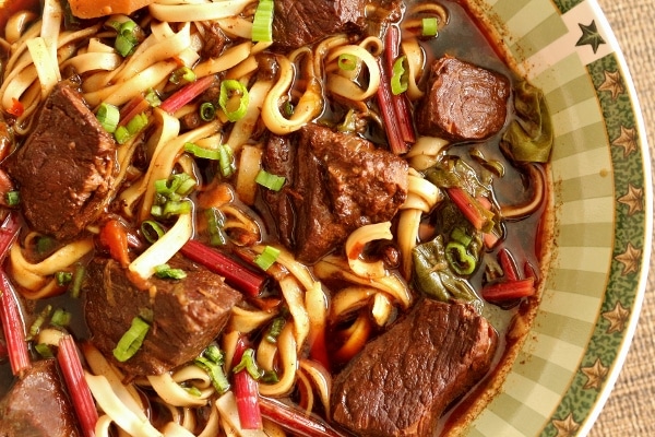 an overview closeup of a bowl of Taiwanese beef noodle soup
