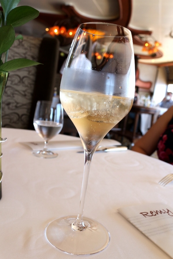 a glass of chilled Champagne served with ice