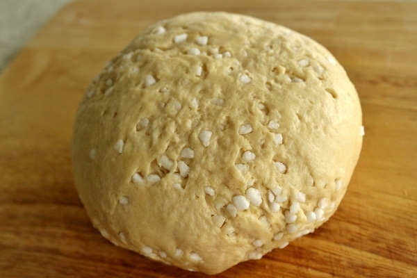 a ball of dough studded with big pieces of pearl sugar