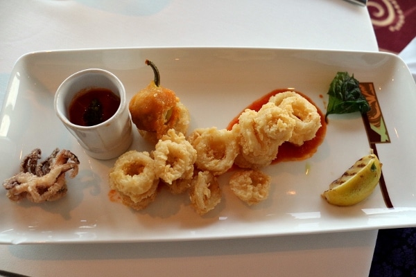 fried calamari on a rectangular white plate