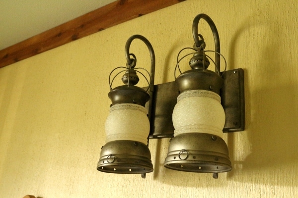 lantern style lights hanging on a wall