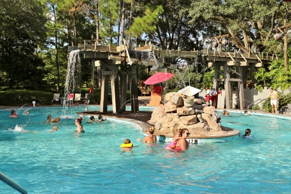 A group of people swimming in a pool