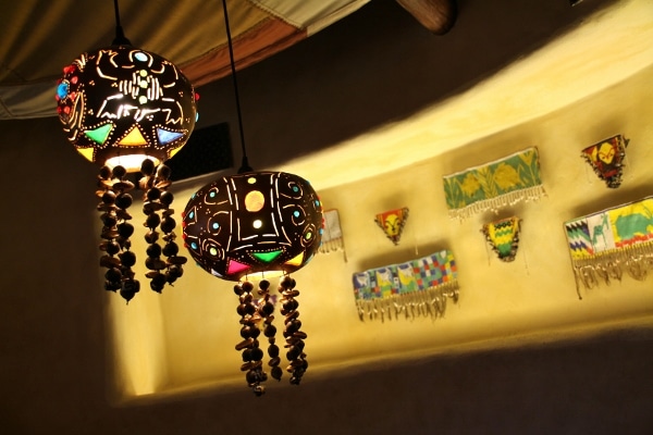 colorful African lighting fixtures and wall decorations