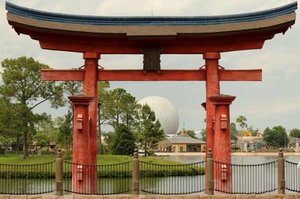 view of Spaceship Earth through the Japanese arch in Epcot\'s Japan Pavilion