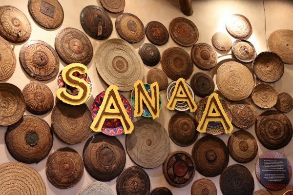 a sign that says Sanaa