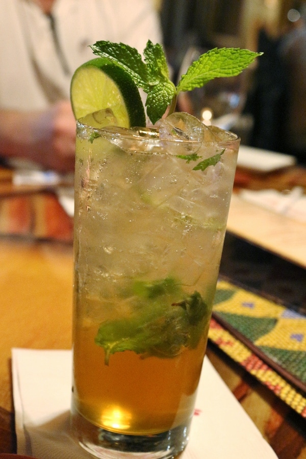 A mojito in a tall glass