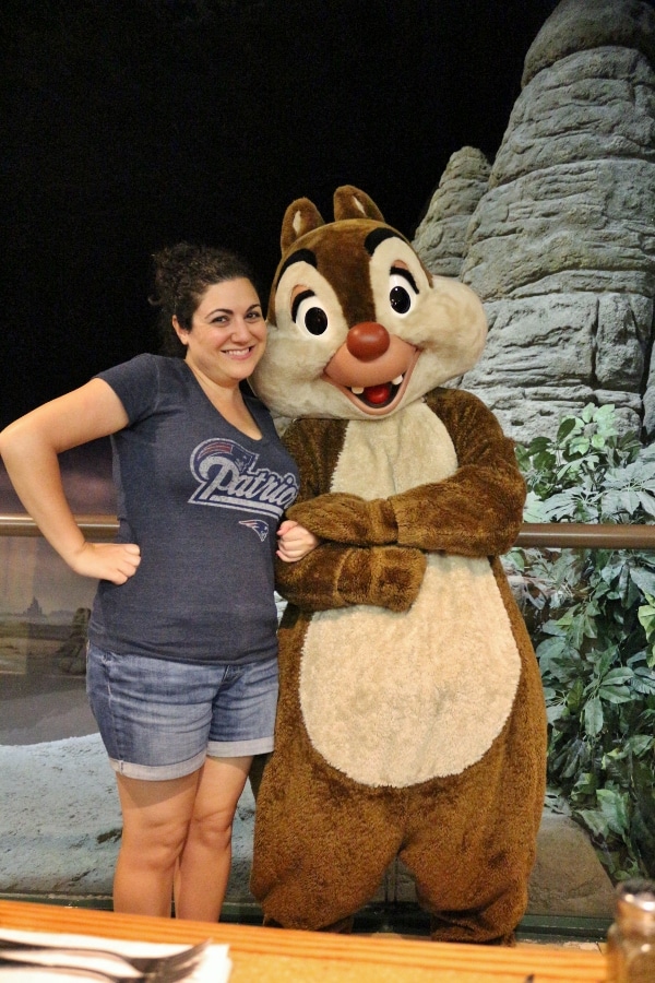 A woman posing with Dale from Chip and Dale