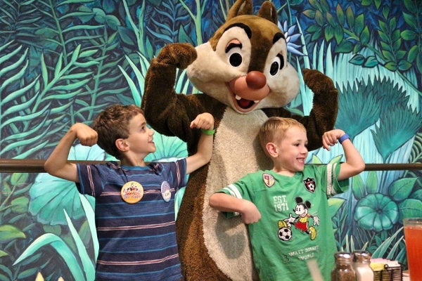 two boys flexing their muscles with Dale